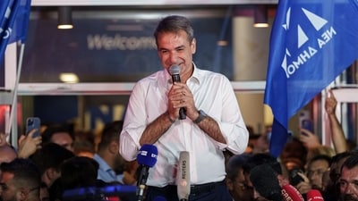 Kyriakos Mitsotakis, Greece's prime minister and leader of New Democracy party, addresses supporters outside the party headquarters. (Bloomberg) Kyriakos Mitsotakis, Greece's prime minister and leader of New Democracy party, addresses supporters outside the party headquarters. (Bloomberg)