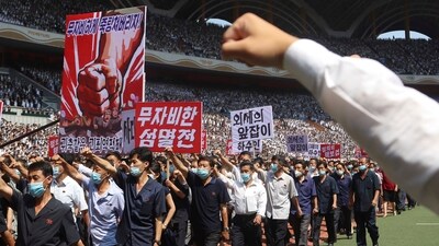 Pyongyang people take part in a demonstration after a mass rally to mark what North Korea calls "the day of struggle against U.S. imperialism". (AP) Pyongyang people take part in a demonstration after a mass rally to mark what North Korea calls "the day of struggle against U.S. imperialism". (AP)