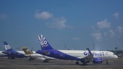 Mumbai: Go First airline aircrafts, formerly known as GoAir, stand parked at the apron of the Mumbai airport. (PTI) Mumbai: Go First airline aircrafts, formerly known as GoAir, stand parked at the apron of the Mumbai airport. (PTI)