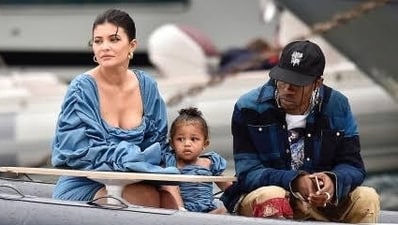 Kylie and Travis with their daughter Stormi' (Hollywood Life) Kylie and Travis with their daughter Stormi' (Hollywood Life)