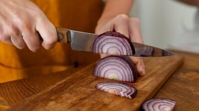 Ever thought why onions make you cry when you chop them? It is because of the release of a compound called syn-propanethial-S-oxide. When exposed to air, it forms sulfuric acid, which irritates eyes or causes a burning sensation in the eyes. (Freepik) Ever thought why onions make you cry when you chop them? It is because of the release of a compound called syn-propanethial-S-oxide. When exposed to air, it forms sulfuric acid, which irritates eyes or causes a burning sensation in the eyes. (Freepik)