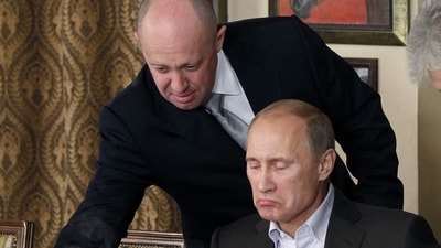 Yevgeny Prigozhin (Left) and Vladimir Putin (Right) (AP) Yevgeny Prigozhin (Left) and Vladimir Putin (Right) (AP)