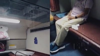 The roof of a coach in Avantika Express leaking during rain. The roof of a coach in Avantika Express leaking during rain.