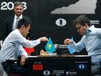 Russia's Ian Nepomniachtchi, right, and China's Ding Liren play during their tiebreaker of FIDE World Chess Championship in Astana, Kazakhstan, Sunday, April 30, 2023. (AP Photo/Stanislav Filippov) Russia's Ian Nepomniachtchi, right, and China's Ding Liren play during their tiebreaker of FIDE World Chess Championship in Astana, Kazakhstan, Sunday, April 30, 2023. (AP Photo/Stanislav Filippov)