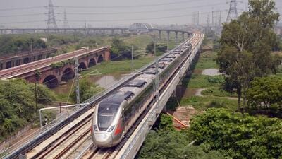 A Rapidx train on the 17km priority section near the Hindon river in Ghaziabad on Tuesday. (Sakib Ali/HT Photo) A Rapidx train on the 17km priority section near the Hindon river in Ghaziabad on Tuesday. (Sakib Ali/HT Photo)