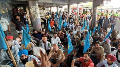 Contractual employees of Punjab Roadways and Pepsu Road Transportation Corporation protesting at Bathinda bus stand on Tuesday. (Sanjeev Kumar/HT) Contractual employees of Punjab Roadways and Pepsu Road Transportation Corporation protesting at Bathinda bus stand on Tuesday. (Sanjeev Kumar/HT)