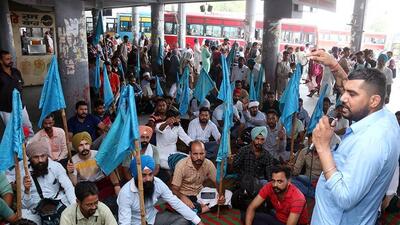 Contractual employees of the Pepsu Road Transport Corporation (PRTC) during a protest at the Bathinda bus stand on Tuesday. They accused the Punjab government of failing to fulfil their demands, including the regularisation of services. (Sanjeev Kumar/HT) Contractual employees of the Pepsu Road Transport Corporation (PRTC) during a protest at the Bathinda bus stand on Tuesday. They accused the Punjab government of failing to fulfil their demands, including the regularisation of services. (Sanjeev Kumar/HT)