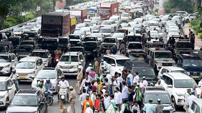 Farmers block Mahamaya flyover as they wait for Rakesh Tikait in Noida on Tuesday. (Sunil Ghosh/HT Photo) Farmers block Mahamaya flyover as they wait for Rakesh Tikait in Noida on Tuesday. (Sunil Ghosh/HT Photo)