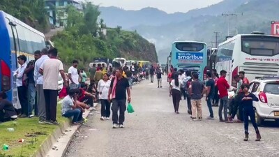 Tourists had a harrowing time on Monday waiting for the clearing of blocked Chandigarh-Manali highway. (PTI) Tourists had a harrowing time on Monday waiting for the clearing of blocked Chandigarh-Manali highway. (PTI)