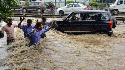 An orange warning implies that disaster management authorities should be prepared to avert any rain related disasters or flooding. (PTI) An orange warning implies that disaster management authorities should be prepared to avert any rain related disasters or flooding. (PTI)