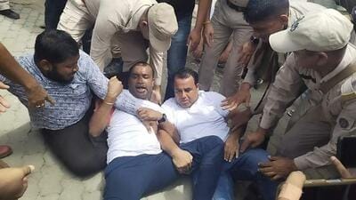 Police detaining protesters. (Sourced) Police detaining protesters. (Sourced)