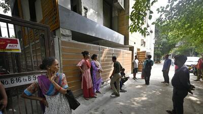 Relatives of the deceased gather outside the home in Jangpura Extension, on Tuesday (Sanjeev Verma/HT) Relatives of the deceased gather outside the home in Jangpura Extension, on Tuesday (Sanjeev Verma/HT)