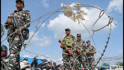 Security personnel stand guard ahead of the Amarnath Yatra 2023, at the Bhagwati Nagar base camp in Jammu on June 27 (PTI) Security personnel stand guard ahead of the Amarnath Yatra 2023, at the Bhagwati Nagar base camp in Jammu on June 27 (PTI)