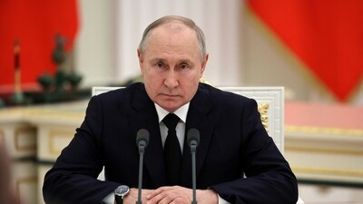 Russian president Vladimir Putin attends a meeting with service members at the Kremlin in Moscow. (Reuters)
