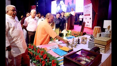 Uttar Pradesh chief minister Yogi Adityanath at a loan distribution programme in Lucknow on June 27. (HT photo)