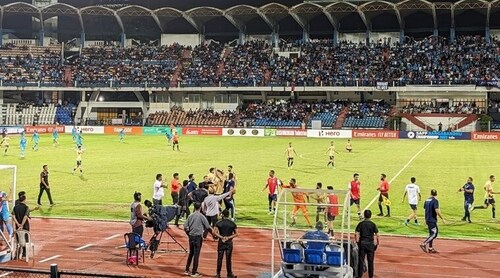 Kuwait goalkeeper Bader M A M A Bin Saanoun makes angry gesture at Indian players and staff sitting in the dugout during SAFF Championship. (HT Photo/Shivam Saha) Kuwait goalkeeper Bader M A M A Bin Saanoun makes angry gesture at Indian players and staff sitting in the dugout during SAFF Championship. (HT Photo/Shivam Saha)