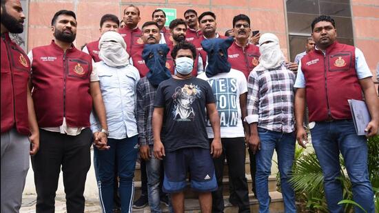 Delhi Police crime branch arrested five people in connection with the gunpoint robbery inside Pragati Maidan tunnel on Tuesday. Three suspects were arrested on Monday. (Arvind Yadav/HT Photo)