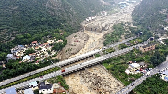 The landslides, triggered by flash floods, occurred in Miansi and Weizhou townships in Wenchuan county, according to the county’s emergency management bureau. (AP)