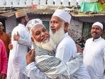 Mirzapur: Muslims greet each other after offering Eid-ul-Fitr namaz, in Mirzapur, Saturday morning, April 22, 2023. (PTI Photo) 
(PTI04_22_2023_000076B)