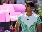 Carlos Alcaraz receives medical attention as he plays against Alex de Minaur during their men's singles final match at the Cinch ATP tennis Championships Carlos Alcaraz receives medical attention as he plays against Alex de Minaur during their men's singles final match at the Cinch ATP tennis Championships