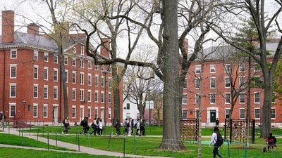Students walk through Harvard Yard, on the campus of Harvard University in Cambridge, Mass. (AP) Students walk through Harvard Yard, on the campus of Harvard University in Cambridge, Mass. (AP)