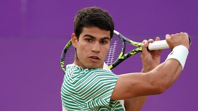 Spain's Carlos Alcaraz during men's singles quarterfinal match at Queen's Club championship (AP) Spain's Carlos Alcaraz during men's singles quarterfinal match at Queen's Club championship (AP)
