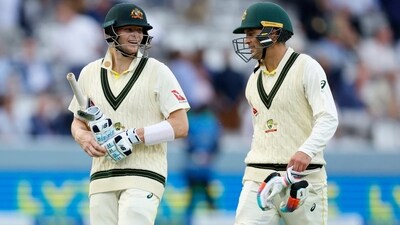 Steve Smith and Alex Carey walk off the filed at stumps (Reuters)