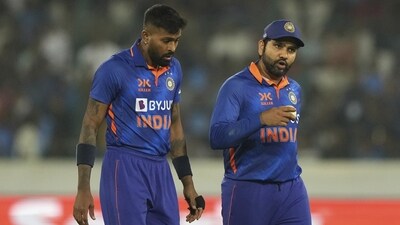 India's Hardik Pandya, left, listens to captain Rohit Sharma (AP) India's Hardik Pandya, left, listens to captain Rohit Sharma (AP)