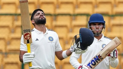 North Zone batter Dhruv Shorey raises bat after scoring a century against North East Zone during a Duleep trophy 2023 match (PTI) North Zone batter Dhruv Shorey raises bat after scoring a century against North East Zone during a Duleep trophy 2023 match (PTI)