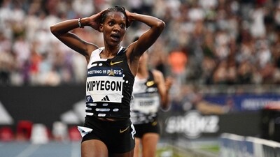 Kenya's Faith Kipyegon reacts as she breaks the World record in the women's 5000m event during the IAAF Diamond League (AFP) Kenya's Faith Kipyegon reacts as she breaks the World record in the women's 5000m event during the IAAF Diamond League (AFP)