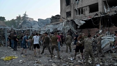 Rescuers and volunteers work to rescue people from under the rubble after a Russian missile strike hit a restaurant and several houses in Kramatorsk, eastern Ukraine, on June 27, 2023. (AFP) Rescuers and volunteers work to rescue people from under the rubble after a Russian missile strike hit a restaurant and several houses in Kramatorsk, eastern Ukraine, on June 27, 2023. (AFP)