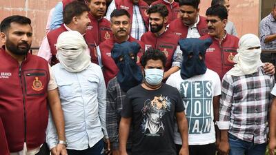 The eight suspects in police custody. Four of them allegedly robbed two delivery agents at the Pragati Maidan tunnel on Saturday. (Arvind Yadav/HT Photo) The eight suspects in police custody. Four of them allegedly robbed two delivery agents at the Pragati Maidan tunnel on Saturday. (Arvind Yadav/HT Photo)