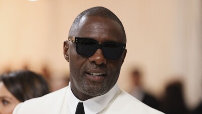 Idris Elba poses at the Met Gala, an annual fundraising gala held for the benefit of the Metropolitan Museum of Art's Costume Institute with this year's theme "Karl Lagerfeld: A Line of Beauty", in New York City. (REUTERS)