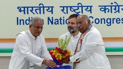 Congress President Mallikarjun Kharge was presented with a bouquet by Chhattisgarh Chief Minister Bhupesh Baghel during the meeting with the state party leaders, at AICC headquarters, in New Delhi on Wednesday. Party leader Rahul Gandhi is also seen. (ANI Photo) Congress President Mallikarjun Kharge was presented with a bouquet by Chhattisgarh Chief Minister Bhupesh Baghel during the meeting with the state party leaders, at AICC headquarters, in New Delhi on Wednesday. Party leader Rahul Gandhi is also seen. (ANI Photo)