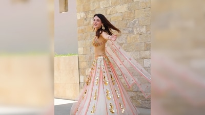 Radhika Madan's set comes with a backless tulle bralette embellished with glass cut beads and chain straps and a tulle baby pink dupatta. (Instagram/@radhikamadan) Radhika Madan's set comes with a backless tulle bralette embellished with glass cut beads and chain straps and a tulle baby pink dupatta. (Instagram/@radhikamadan)