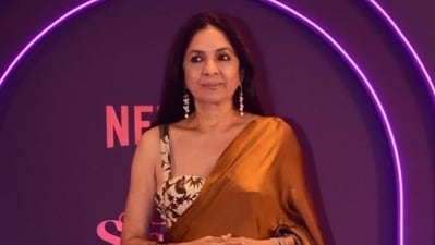 Neena Gupta looked stunning in a brown silk saree at the Lust Stories 2 premiere. She features in the film alongside Mrunal Thakur and Angad Bedi. In the film, she will be seen as an old woman with all-white hair. (Varinder Chawla) Neena Gupta looked stunning in a brown silk saree at the Lust Stories 2 premiere. She features in the film alongside Mrunal Thakur and Angad Bedi. In the film, she will be seen as an old woman with all-white hair. (Varinder Chawla)