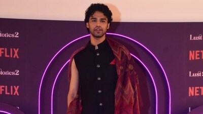 Babil Khan was also spotted at the Lust Stories 2 premiere. He was in a black sleeveless bandhgala with an orange shawl. He made his film debut with Qala on Netflix last year and will now be seen in The Railway Men. (Varinder Chawla) Babil Khan was also spotted at the Lust Stories 2 premiere. He was in a black sleeveless bandhgala with an orange shawl. He made his film debut with Qala on Netflix last year and will now be seen in The Railway Men. (Varinder Chawla)