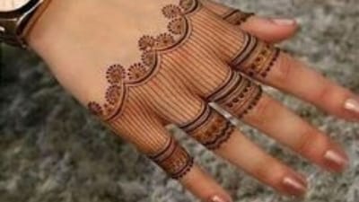 Upper hand mehndi designs: Applying mehndi on the upper side of the hand and decking up in bright colours is a way of celebrating this special occasion. (Pinterest) Upper hand mehndi designs: Applying mehndi on the upper side of the hand and decking up in bright colours is a way of celebrating this special occasion. (Pinterest)