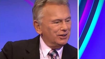 A still of Pat Sajak from Wheel of Fortune.
