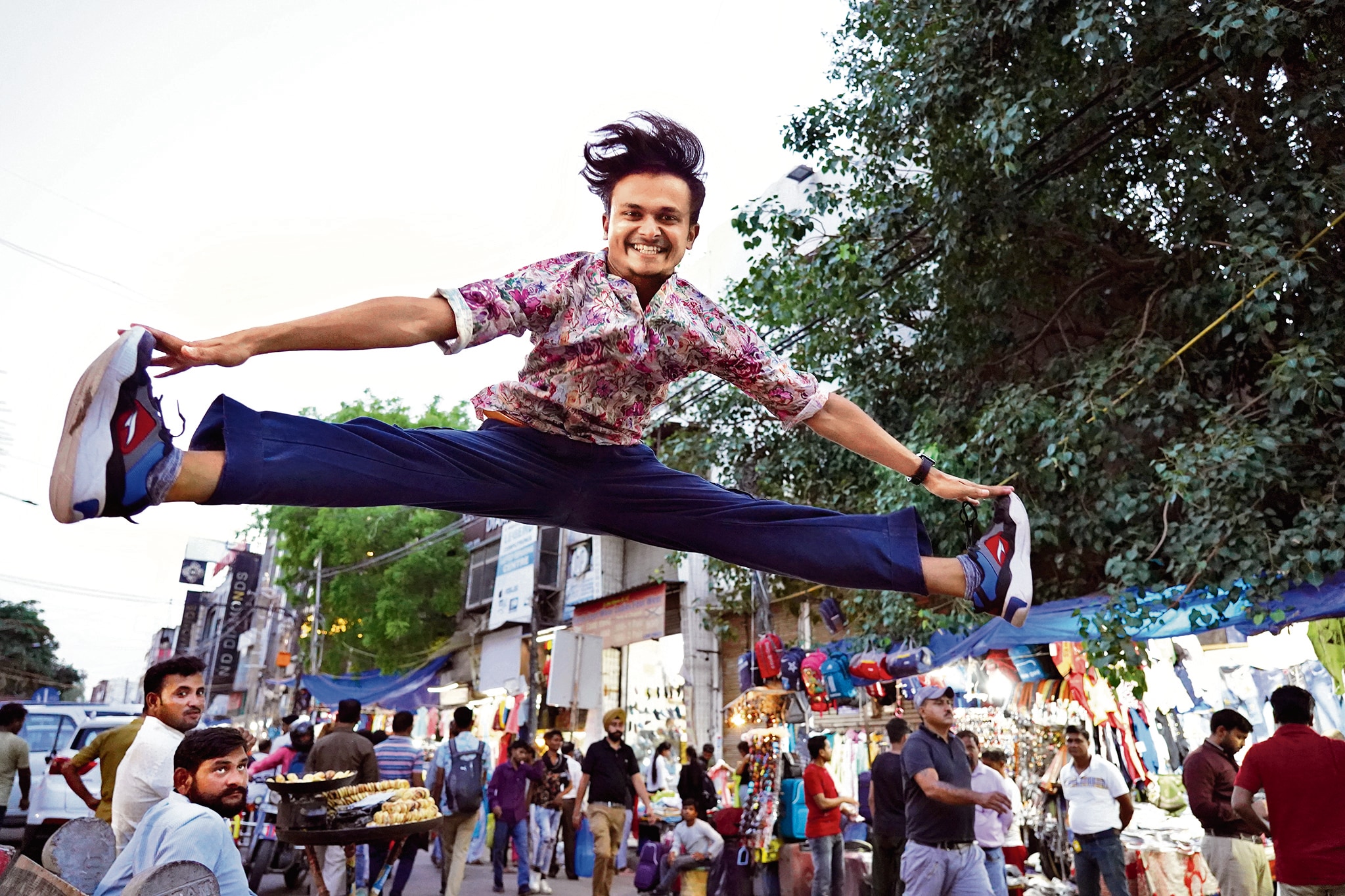 Manish Singh, a student of Ramjas College, hits the jackpot with a fixed price shop at Karol Bagh’s Ajmal Khan Road. (Photo: Gokul VS/HT) Manish Singh, a student of Ramjas College, hits the jackpot with a fixed price shop at Karol Bagh’s Ajmal Khan Road. (Photo: Gokul VS/HT)