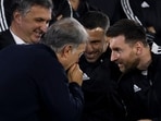 Coach Gerardo Martino, left, talks to Argentina's soccer player Lionel Messi, right, Coach Gerardo Martino, left, talks to Argentina's soccer player Lionel Messi, right,