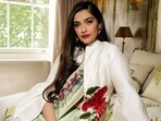Sonam Kapoor wore a saree and an overcoat for the reception. Sonam Kapoor wore a saree and an overcoat for the reception.