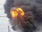 Video footage on social media showed dozens of firefighters at the scene and black smoke billowing high into the air.