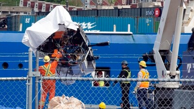 Debris from the Titan submersible, recovered from the ocean floor near the wreck of the Titanic, is unloaded from the ship Horizon Arctic at the Canadian Coast Guard pier in St. John's, Newfoundland, Wednesday, June 28, 2023. AP/PTI(AP06_28_2023_000233A) (AP)