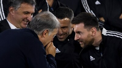 Coach Gerardo Martino, left, talks to Argentina's soccer player Lionel Messi, right, (AP) Coach Gerardo Martino, left, talks to Argentina's soccer player Lionel Messi, right, (AP)