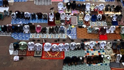 Muslim devotees offer Eid al-Adha prayers at the Jama Masjid in the old quarters of New Delhi. (AFP) Muslim devotees offer Eid al-Adha prayers at the Jama Masjid in the old quarters of New Delhi. (AFP)