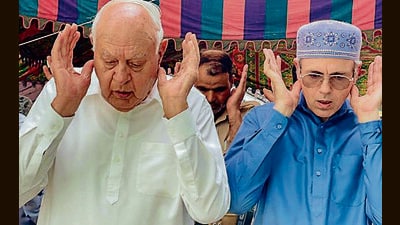 National Conference chief Farooq Abdullah with his son Omar Abdullah offering prayer at Hazratbal Shrine in Srinagar on Thursday. (ANI) National Conference chief Farooq Abdullah with his son Omar Abdullah offering prayer at Hazratbal Shrine in Srinagar on Thursday. (ANI)