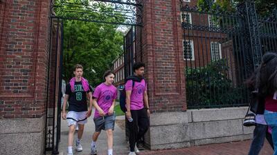 People exit Harvard Yard in Cambridge, Massachusetts, on Thursday. The US Supreme Court the use of race and ethnicity in university admissions, dealing a major blow to a decades-old practice that boosted educational opportunities for African-Americans and other minorities. (AFP) People exit Harvard Yard in Cambridge, Massachusetts, on Thursday. The US Supreme Court the use of race and ethnicity in university admissions, dealing a major blow to a decades-old practice that boosted educational opportunities for African-Americans and other minorities. (AFP)