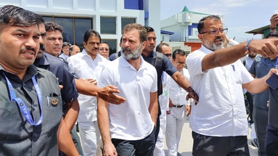 Congress leader Rahul Gandhi with party leader KC Venugopal and others at Imphal airport. (PTI) Congress leader Rahul Gandhi with party leader KC Venugopal and others at Imphal airport. (PTI)