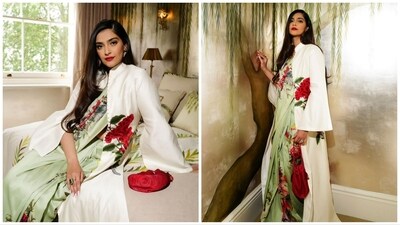 Sonam Kapoor wore a saree and an overcoat for the reception. Sonam Kapoor wore a saree and an overcoat for the reception.